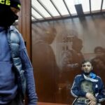 Теракт в Москве: Кремль обвиняет четверых мужчин и Украину
